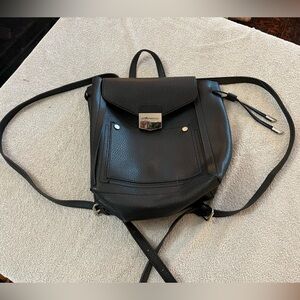 Steve Madden purse backpack drawstring black silver‎ interior